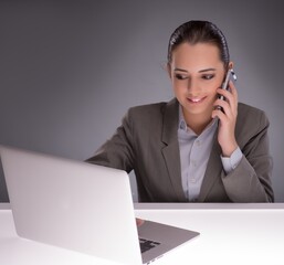 Young businesswoman working with laptop in business concept