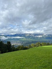 Fototapeta na wymiar Mountain Valley Landscape with Clouds