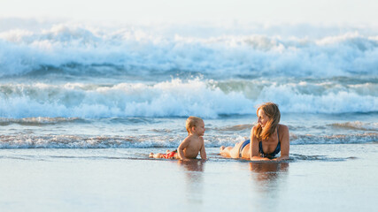 Happy family have fun on tropical sea beach resort