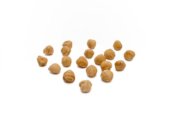 hazelnuts arranged in triangle. hazelnut isolated on a white background. Full depth of field. close up