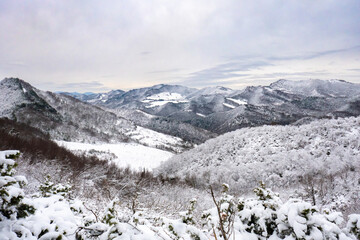 Winter snowy landscape of Appennino Tosco-emiliano between Marradi (Florence) and Brisighella, Emilia Romagna, Italy