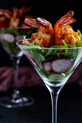 Grilled shrimp salad with arugula, snap peas, radishes, cucumber, and grape tomatoes.
.