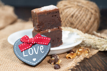 gluten free brownie, handmade with sign with the word love, wheat ear and rustic decoration.