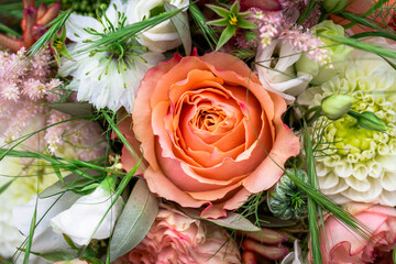 bouquet of flowers with various flowers and decorative plants