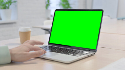 Man Using Laptop with Chroma Key Green Screen