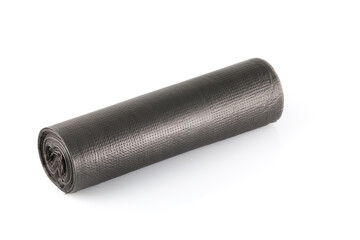 Roll of black plastic garbage bags isolated on white background. Full depth of field. Close-up