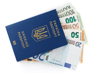 Passports of citizens of Ukraine for traveling abroad. European banknotes in ukrainian passport on...