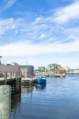 Small fishing town with colourful houses near Peggys Cove, Halifax, Nova Scotia, Canada. Beautiful sunny day view.
