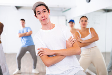 Fototapeta na wymiar Dance group teaches hip-hop dance in dance studio