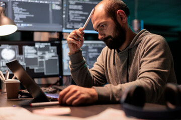 Pensive coder brainstorming ideas to find source code and develop html script on terminal window....