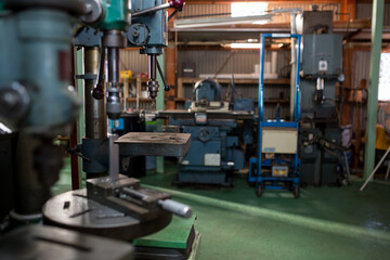 Part machining with drilling machine