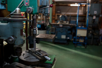 Part machining with drilling machine