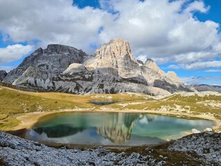 View on the turquoise color lake in the Dolomites. Beautiful alpine landscape. South Tyrol, Italy. Unesco world heritage