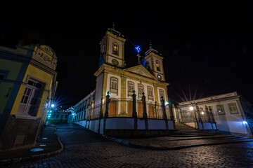 Fototapeta na wymiar Sao Joao del Rei, Minas Gerais, Brazil: Street view of Nossa Senhora do Pilar church facade at night