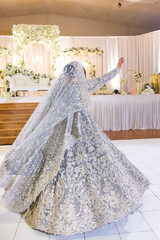 Afghani bride's in a traditional wedding dress back view