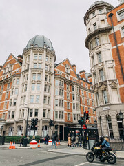 Naklejka premium corner view of the old city with tall buildings