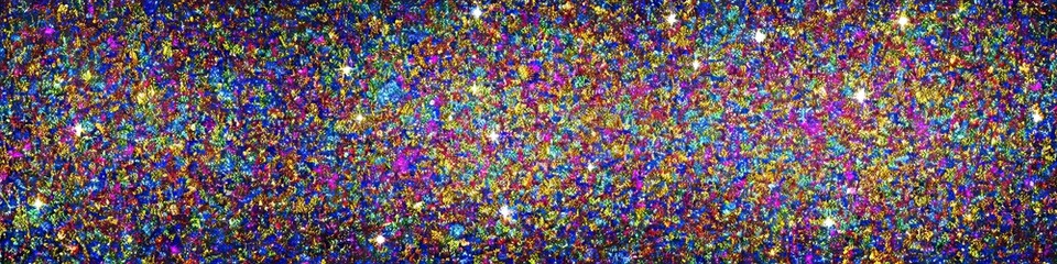 Fototapeta na wymiar Panoramic image of polychromatic magical glitter. Full spectrum of a rainbow of colors
