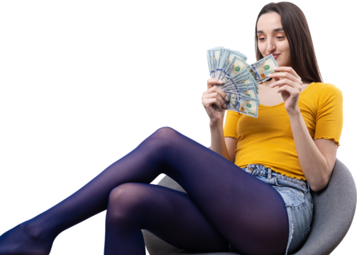 Photo of rich woman in simple clothes holding fan of dollar money isolated on white background