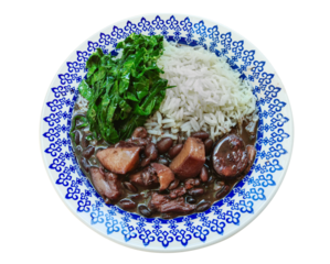 Traditional Brazilian feijoada with cabbage and rice