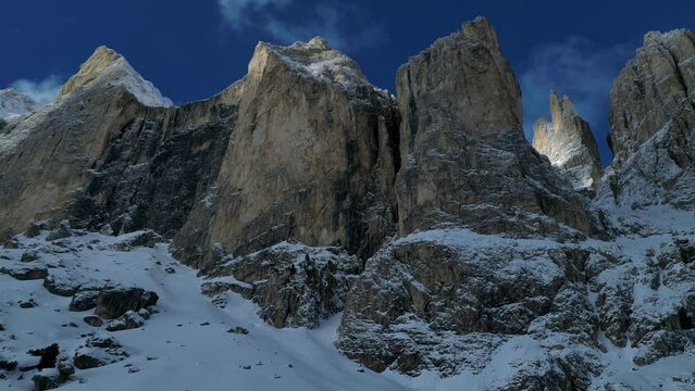 Drone footage of tiny winter hikers on their way to Rifugio Vaiolet, January 2023, Dolomites, Italy