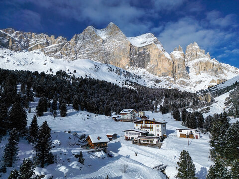Vigo di Fassa, Dolomites, Italy, January 20th 2023. Gardeccia and Stella Alpina refuges on a winter hiking trail towards Rifugio Vaiolet.