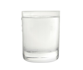 Shot glass of vodka with ice isolated on white