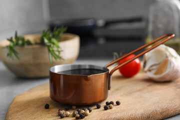 Organic balsamic vinegar and cooking ingredients on table