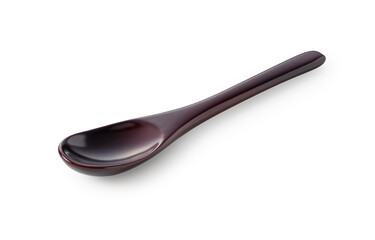 Lacquered spoons placed on a white background.