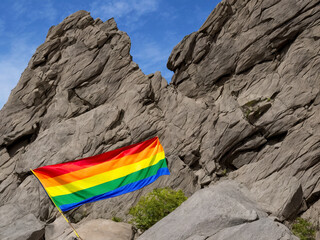 Pride and Nature: LGBT Flag and Mountain Scenery