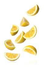 Fresh ripe lemon slices falling on white background