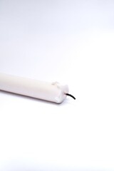 White candle isolated on white background