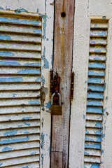 Closeup of old window with peeled paint