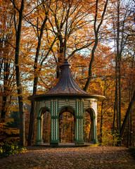 Autumnal Retreat: A Pavilion Nestled Amongst the Trees