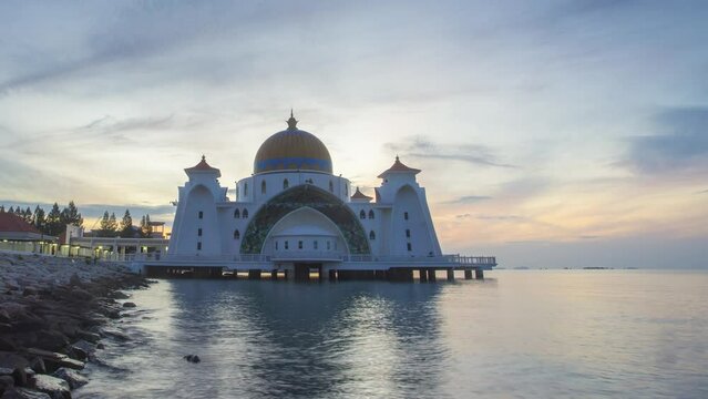 Time-lapse of Majestic Malacca Straits Mosque during sunset. Zoom Out effect