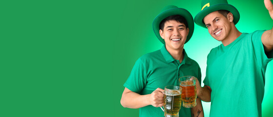 Young men with beer taking selfie on green background with space for text. St. Patrick's Day celebration