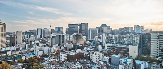 Fototapeta premium City Skyline at Sunset, Urban Panorama with Warm Light, Seoul