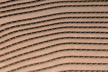 corrugated cardboard used for packing and shipping and made out of recycled goods