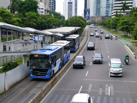 Transjakarta brt transit at bus station Karet sudirman in busy traffic on january 8, 2023 in jakarta, indonesia.