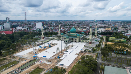 Aerial view of Raya Annur Mosque Largest Masjid in Pekanbaru, Ramadan Eid Concept background, Beautiful Landscape mosque, Islamic background Mosque