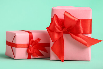 Gifts for Valentine's Day celebration on color background