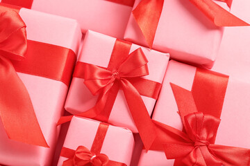 Different gifts for Valentine's Day celebration on pink background, closeup