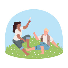 couple on grass with flowers