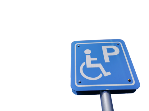 Handicapped parking area sign for wheelchair person.