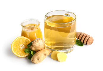 Fresh ginger roots, lemon, honey and cup of tea isolated on white background