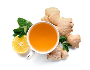 Fresh ginger roots, lemon and cup of tea isolated on white background