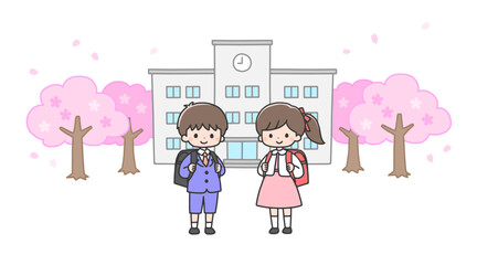 入学式　校舎の前に立つ新一年生の男の子と女の子