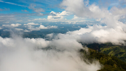 Fototapeta na wymiar Aerial view of Blue sky with clouds over the mountains. View over the clouds. Sri Lanka, Lipton's Seat.