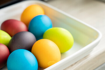 Painted eggs on the table after painting, a symbol of Easter, eggs 