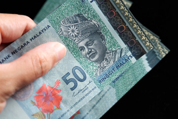 Obraz premium Close up of Malaysia 50 Ringgit current banknotes