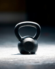 Naklejka na ściany i meble Fitness, motivation or kettlebell at a gym with mockup space for strength training, exercise or workout. Zoom, metal equipment or heavy weight for strong muscle development or growth in health club